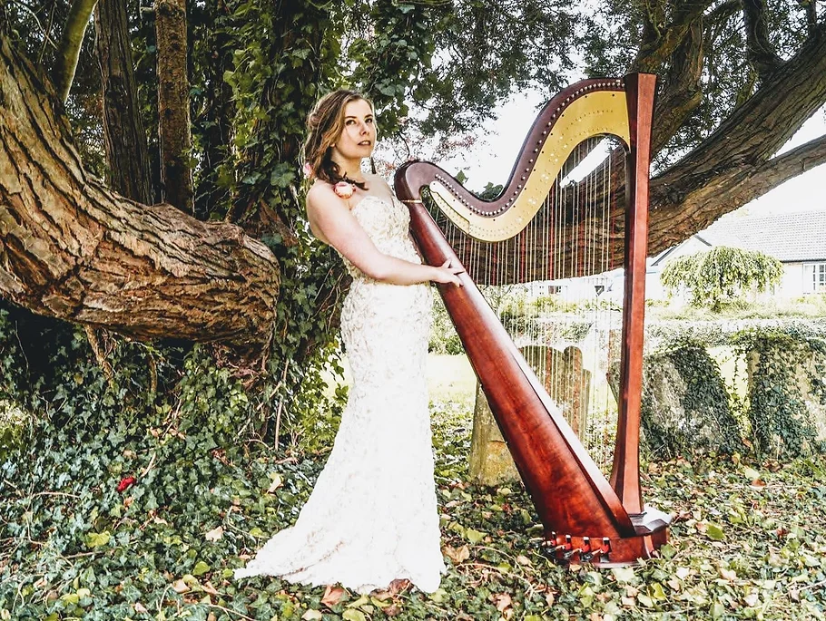 Chloe Chousmer-Kerr playing the harp